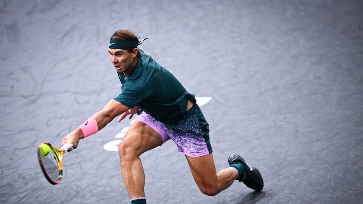 Rafael Nadal returns the ball to Australia's Jordan Thompson during their men's singles round of Paris Masters. — AFP