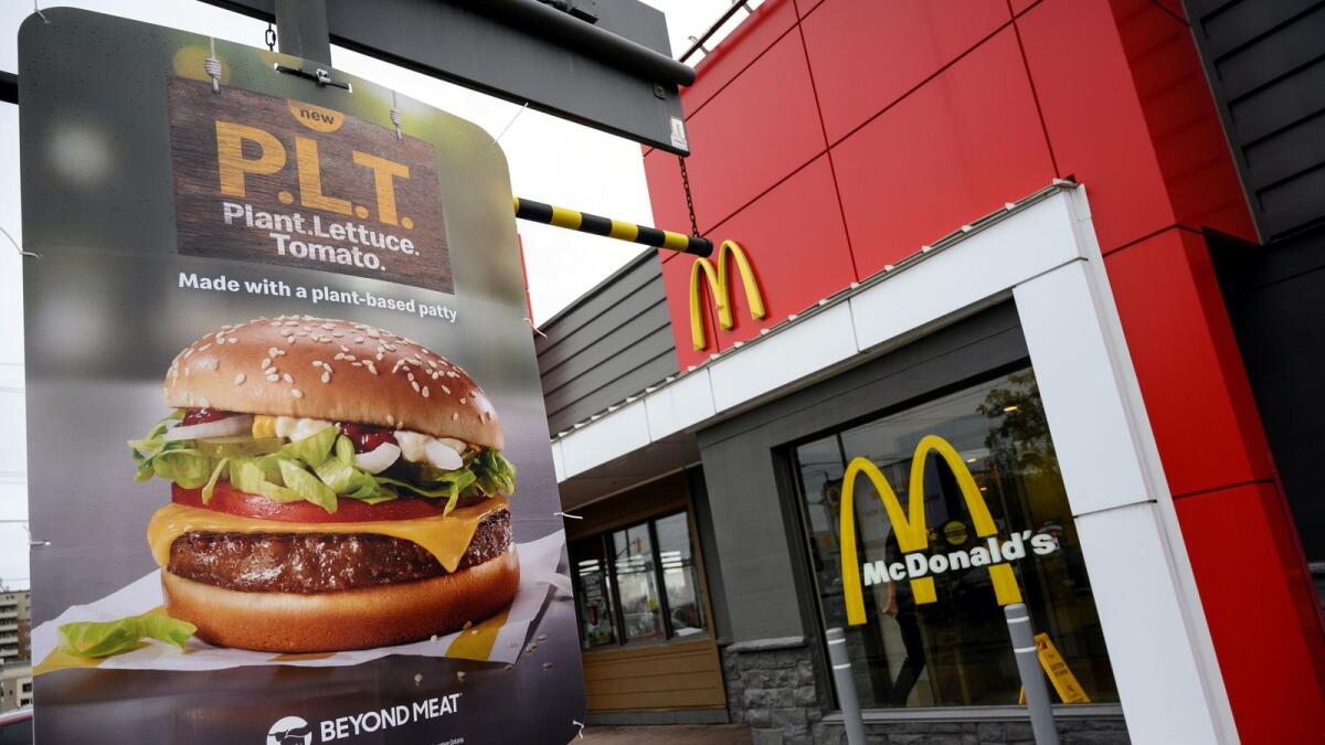 A sign promoting McDonald's 'PLT' burger with a Beyond Meat plant-based patty at one of 28 test restaurant locations in Ontario, Canada October 2, 2019.