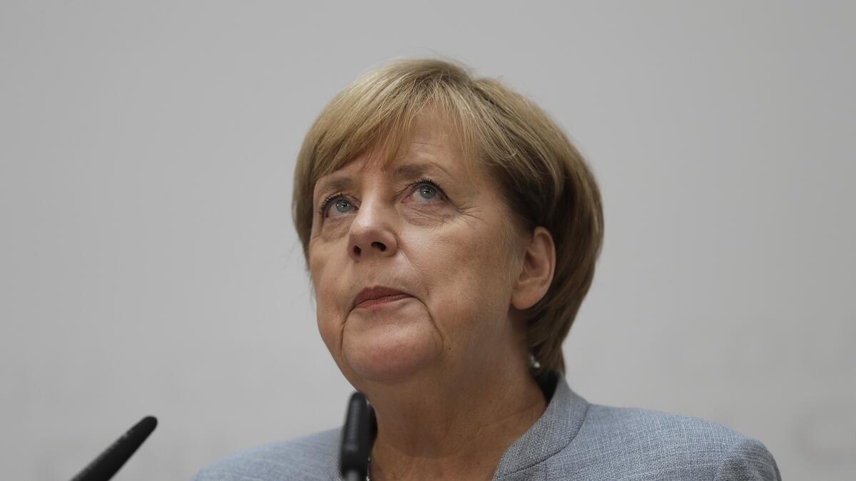 Merkel faces uphill task  of forming a new govt