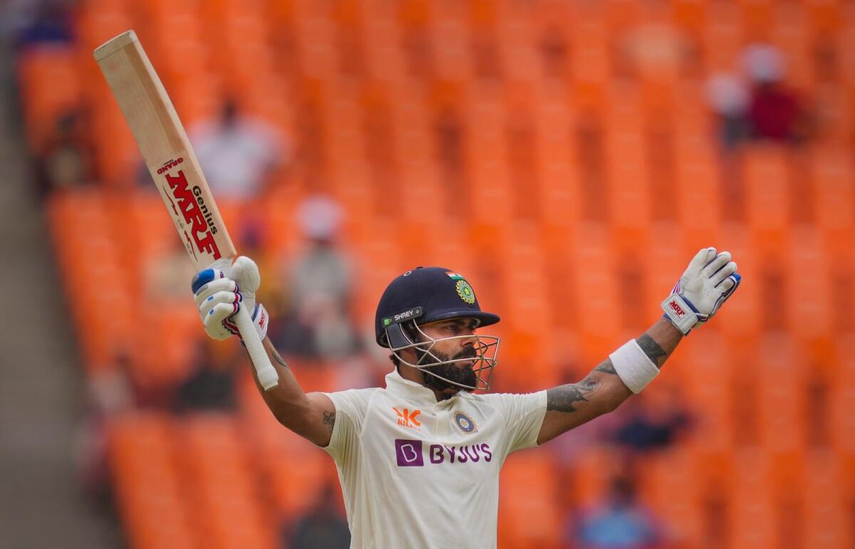 Indian batter Virat Kohli celebrates after scoring 150 on Sunday. — AFP