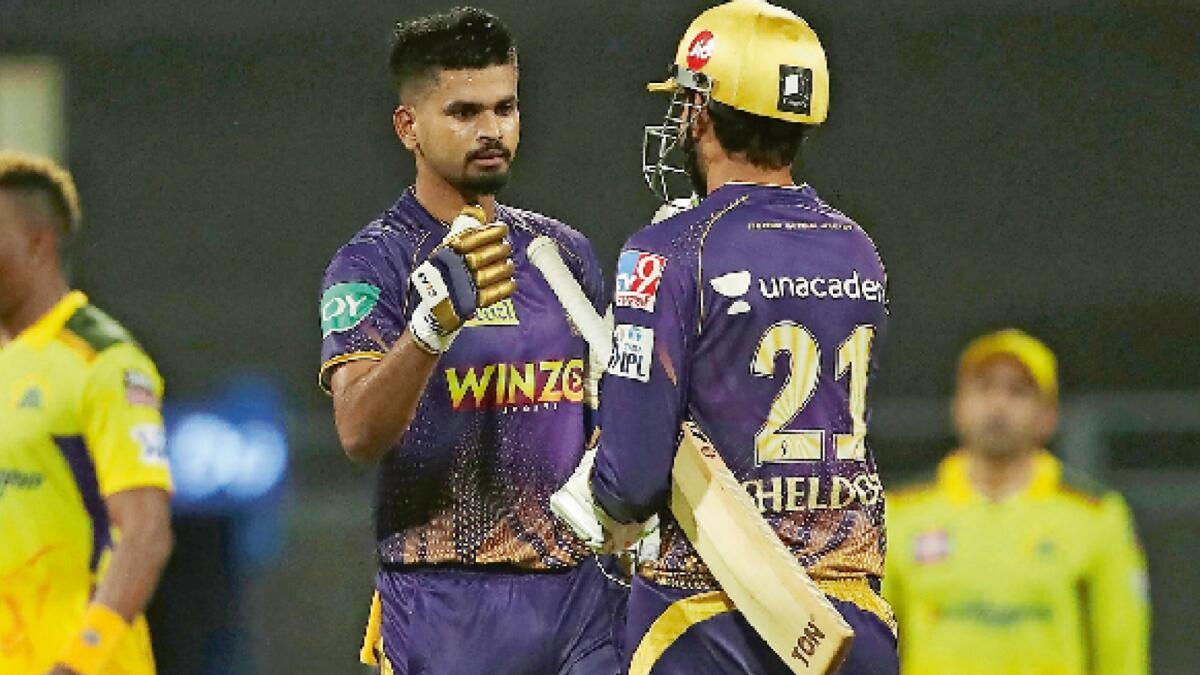 Sheldon Jackson and Shreyas Iyer of Kolkata Knight Riders celebrate their team’s win against Chennai Super Kings in the first match of the Indian Premier League 2022 in Mumbai on Saturday. (PTI)