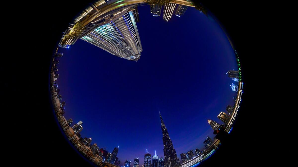 A picture taken with a fish-eye lens shows Dubai's Burj Khalifa. Photo: AFP