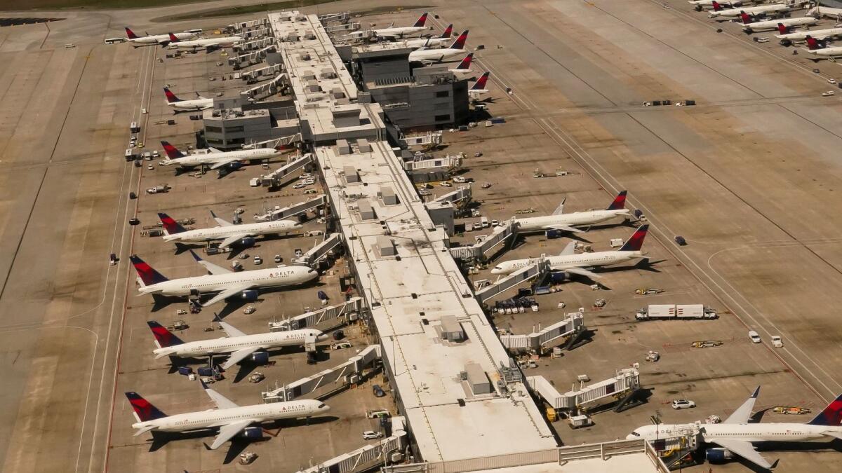 Delta commercial airliners are seen at Hartsfield-Jackson Atlanta International Airport. — Reuters