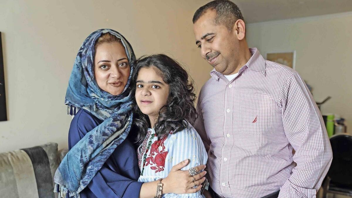 Heba Ali Khan with her parents Farheen and Anwar during an interview at their home in Sharjah. — KT photo by Dhes Handumon