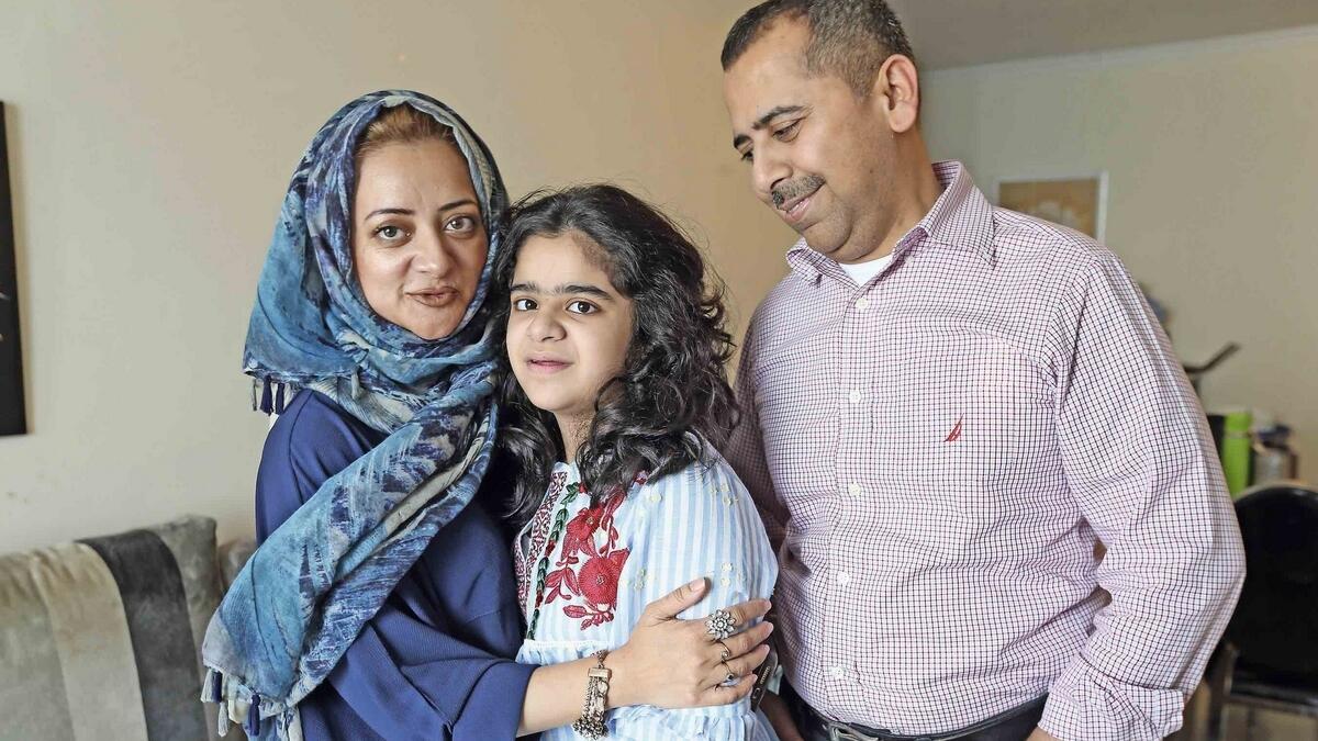 Heba Ali Khan with her parents Farheen and Anwar during an interview at their home in Sharjah. — KT photo by Dhes Handumon