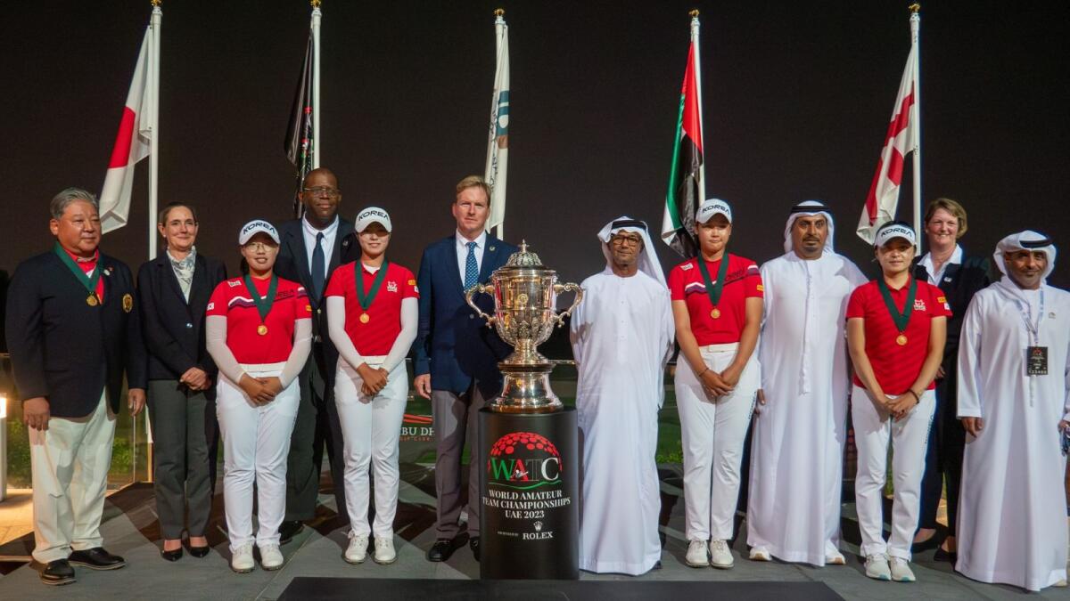 South Korea, winners of the Espirito Santo Trophy, with officials and organisers in Abu Dhabi. - Supplied photo