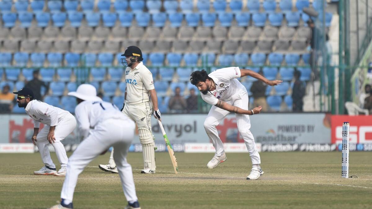 India's Ishant Sharma bowls during the first Test against New Zealand in Kanpur. — PTI