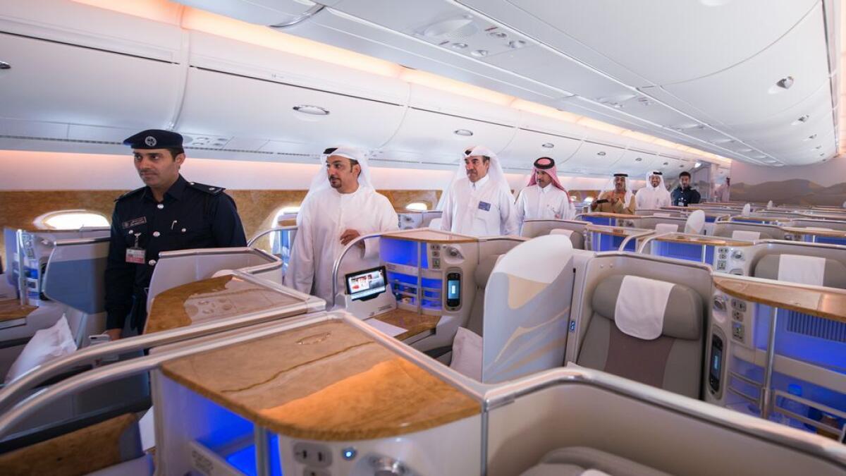 Senior Emirates official Adil Al Ghaith leads a tour of the Emirates A380.