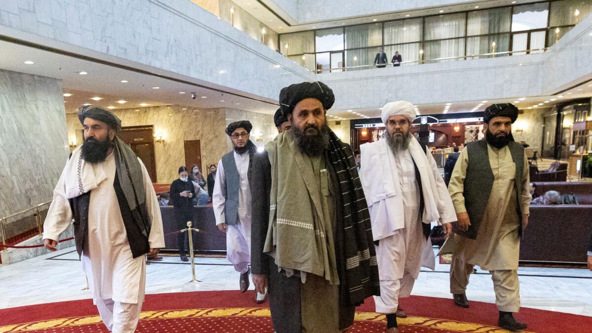 Taliban co-founder Mullah Abdul Ghani Baradar (centre) and other members of the Taliban. Photo: AFP