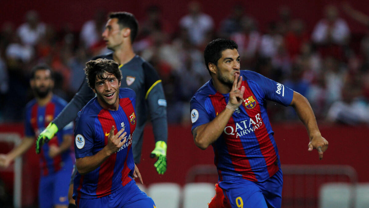 Suarez gives Barca edge