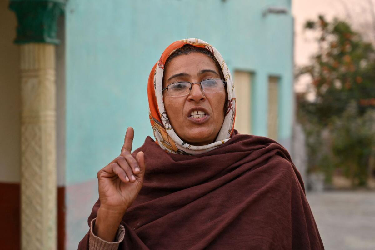 Robina Kausir, a healthcare worker, speaks during an interview with AFP in Dhurnal of Punjab province, ahead of the upcoming general elections. — AFP