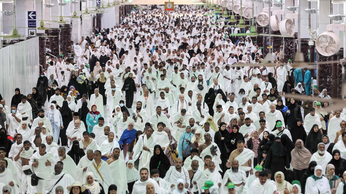 Muslim worshippers perform the 'Umrah' pilgrimage walk between the Marwa and Safa hills at the Grand Mosque in the holy city of Makkah on March 23 — the first day of the holy fasting month of Ramadan. — AFP