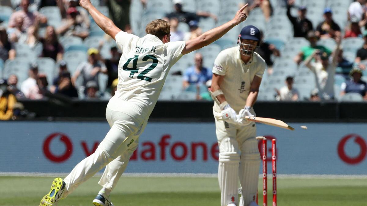 Australia's paceman Cameron Green (left) celebrates the final wicket of England batsman James Anderson. (AFP)
