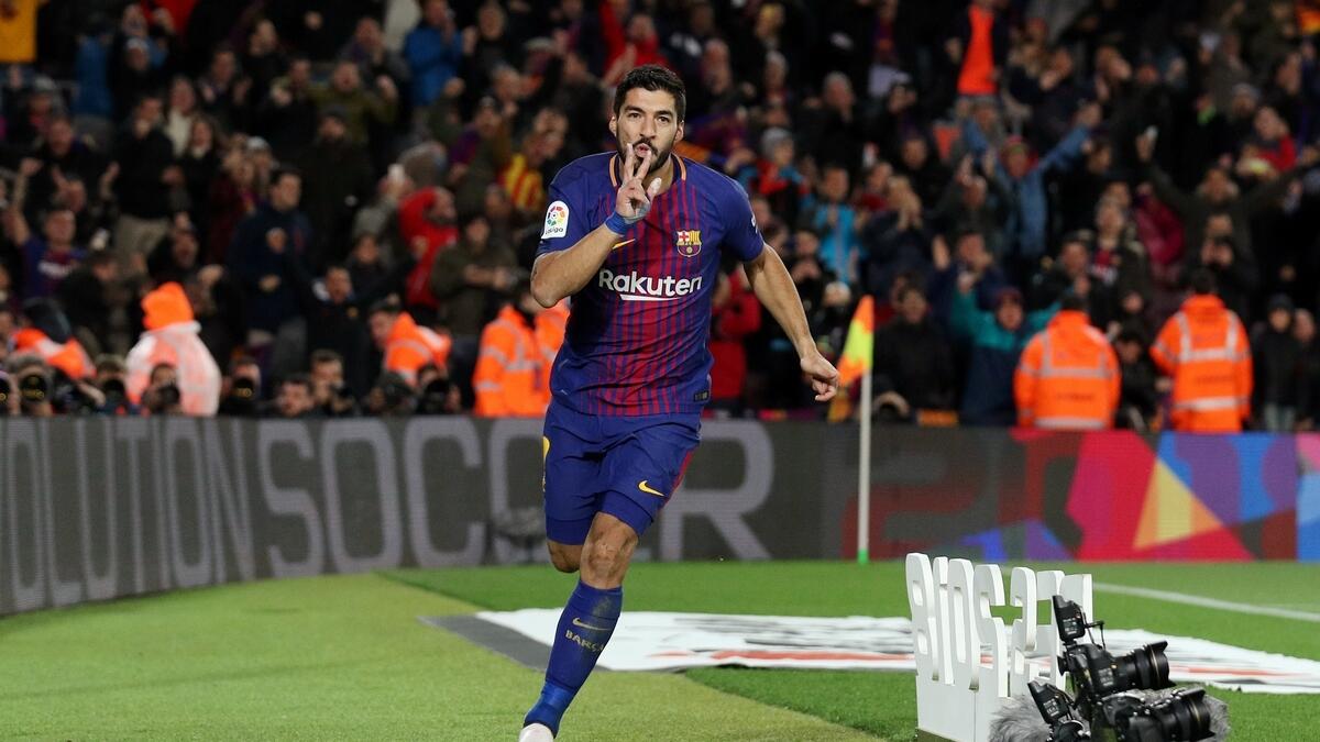 Suarez fires Barcelona to victory