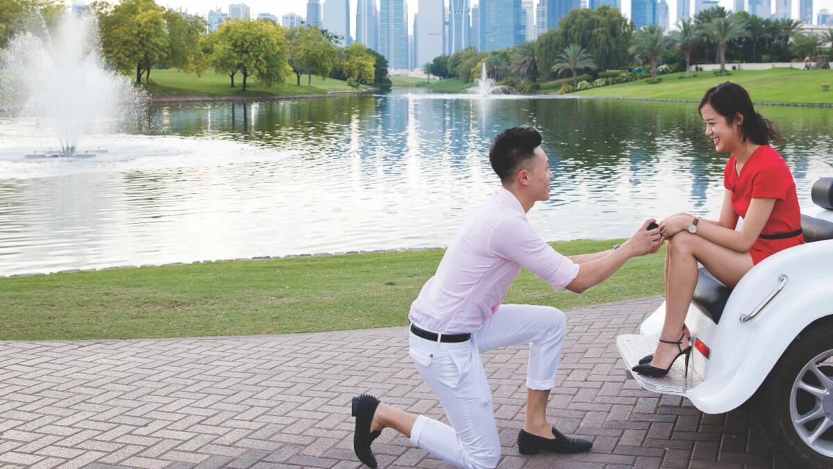 Taiwanese national Huang Chen proposing to his partner Susan Zhang — not once but thrice on a single day, in air, on land and underwater