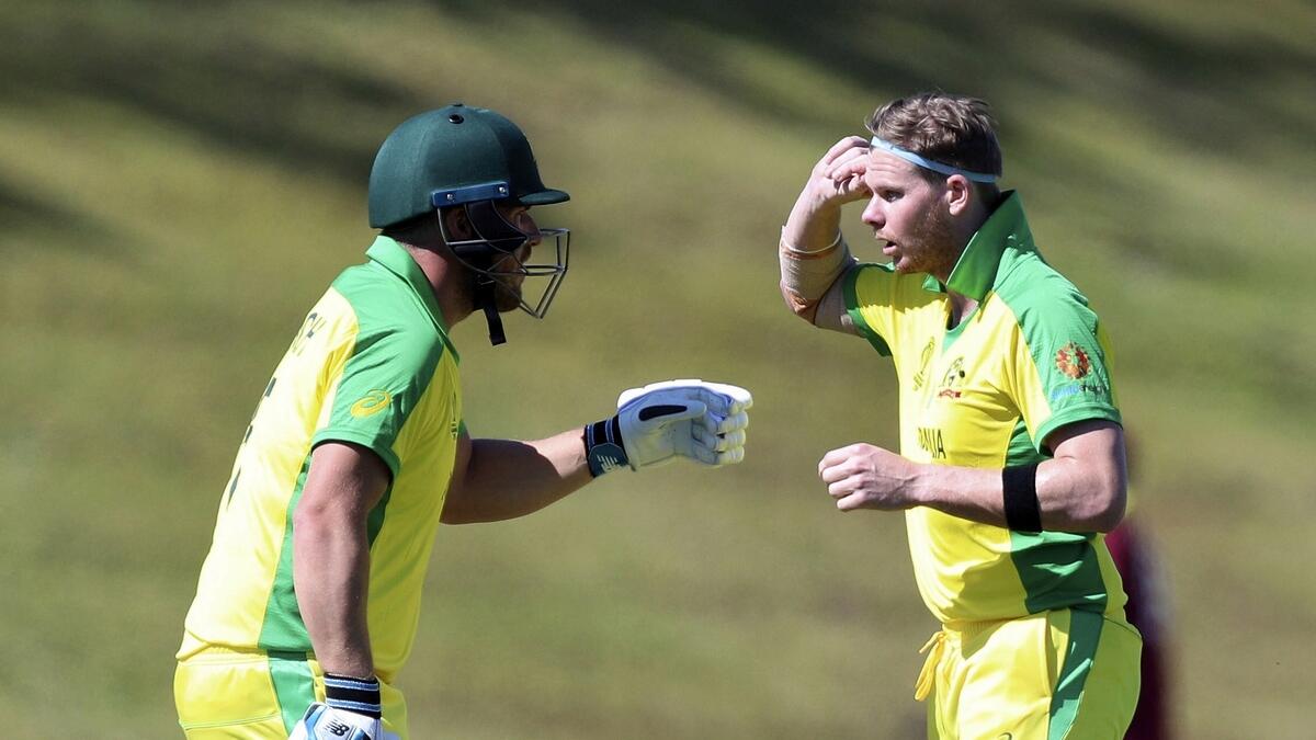 Smith makes fifty, Khawaja injured in World Cup warm-up