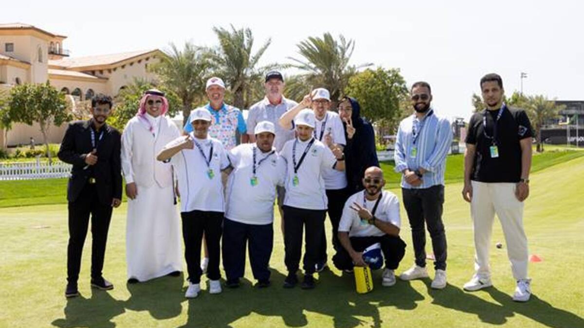 Matt Jones of Ripper GC and Jason Kokrak of Smash GC pose with participants during the LIV Ability Al Nedaa Al Amal Clinic before the start of LIV Golf Jeddah at the Royal Greens Golf &amp; Country Club, Jeddah, Saudi Arabia. - Supplied photo