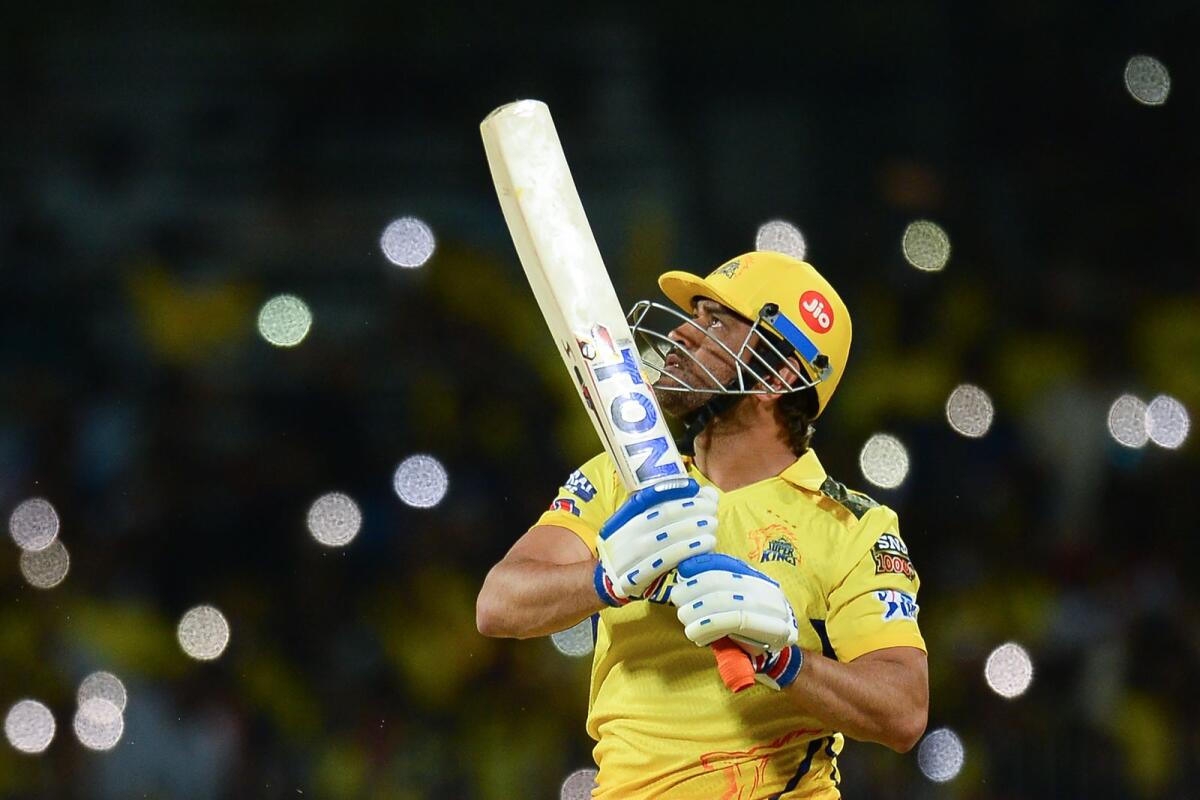 Chennai Super Kings' captain Mahendra Singh Dhoni watches the ball after playing a shot during the Indian Premier League (IPL). Photo: AFP