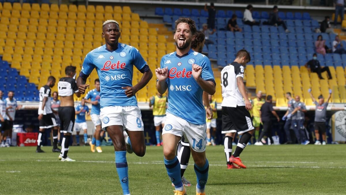Napoliâ?'s Dries Mertens celebrates scoring a goal against Parma  with Victor Osimhen