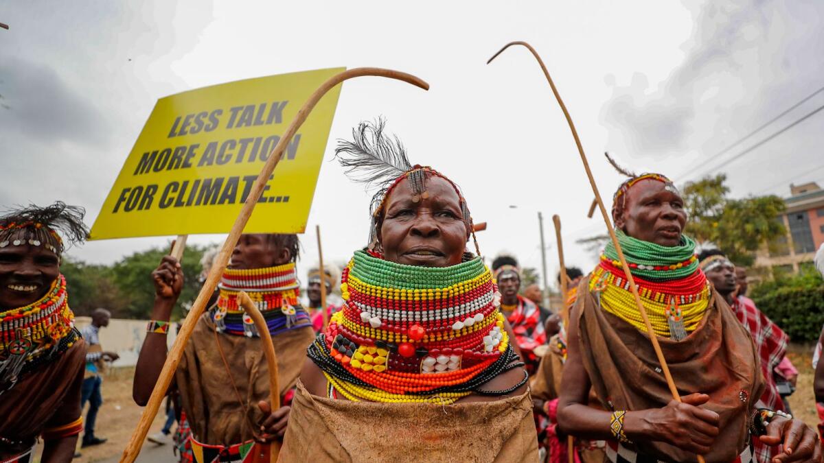 Protesters march to demand action on climate change, in the streets, in Nairobi, Kenya, earlier this month, during the Africa Climate Summit. — AP