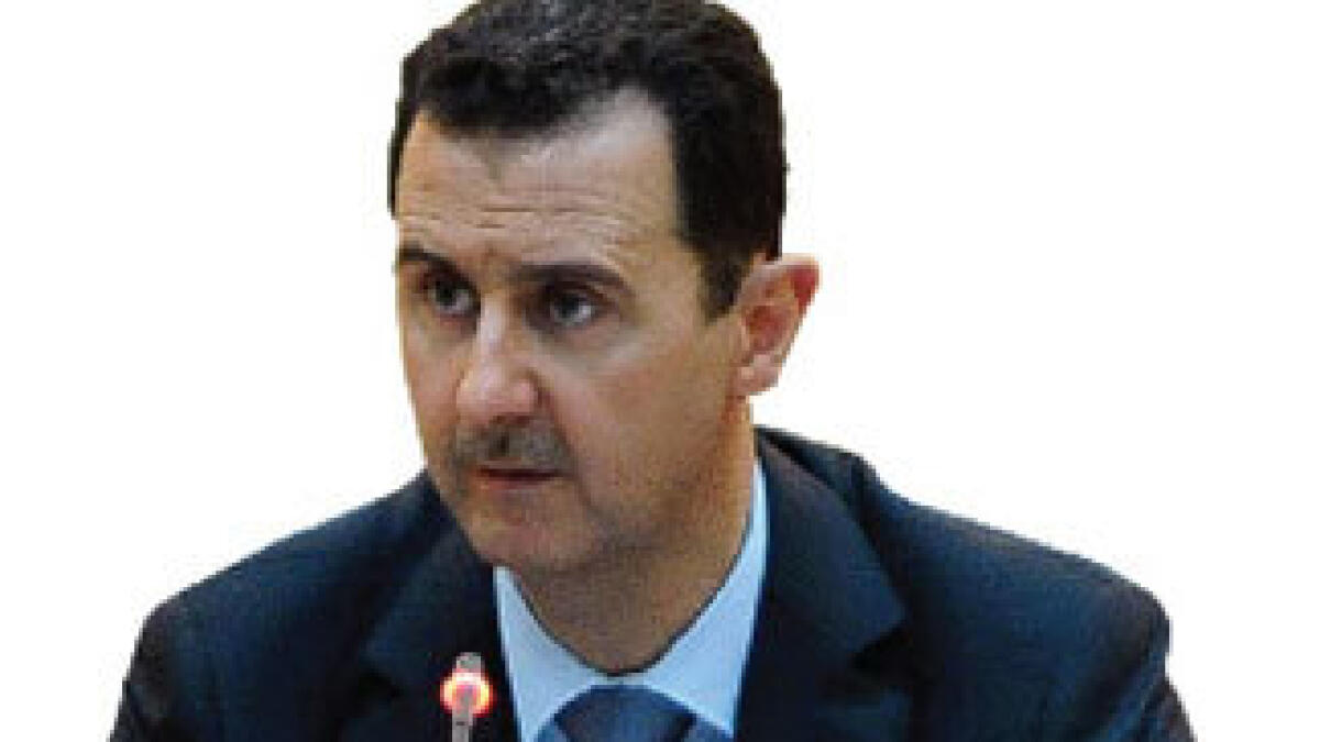 Syria’s Assad appears at Eid prayers as truce starts