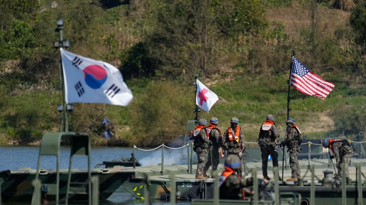 South Korean soldiers take part in a joint river-crossing drill between South Korea and the United States in Yeoju. — AP