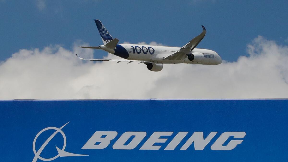 An Airbus A 350-1000 performs a demonstration flight at Paris Air Show in Le Bourget, east of Paris, France. The United States and the European Union on Tuesday clinched a deal to end a damaging dispute over subsidies to Airbus and Boeing and lift billions of dollars in punitive tariffs.— AP file photo