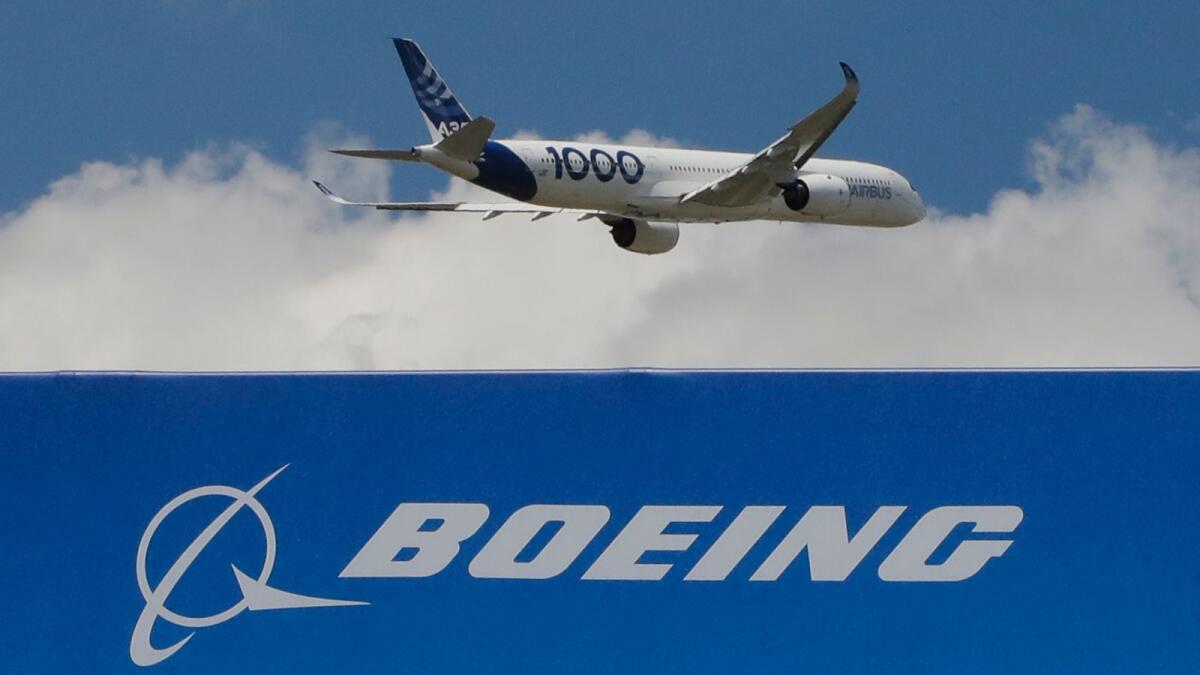 An Airbus A 350-1000 performs a demonstration flight at Paris Air Show in Le Bourget, east of Paris, France. The United States and the European Union on Tuesday clinched a deal to end a damaging dispute over subsidies to Airbus and Boeing and lift billions of dollars in punitive tariffs.— AP file photo