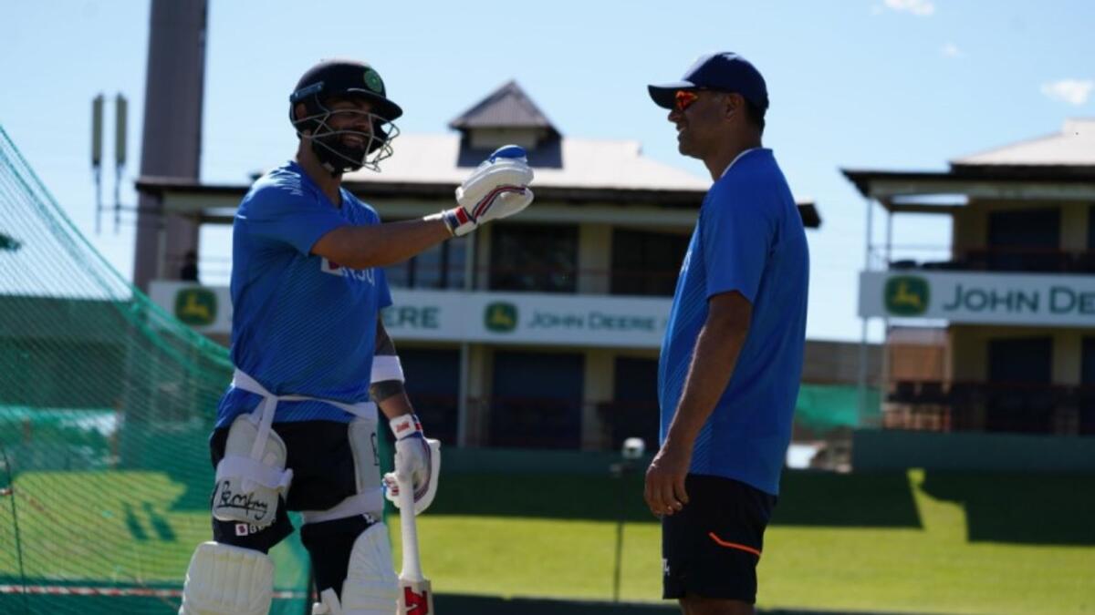 Indian coach Rahul Dravid (right) with captain Virat Kohli during a nets session. (BCCI Twitter)