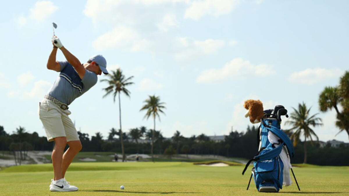 Northern Ireland's Rory McIlroy plays a shot on the tenth hole during a charity golf event in Florida on May 17, 2020. -- AFP file