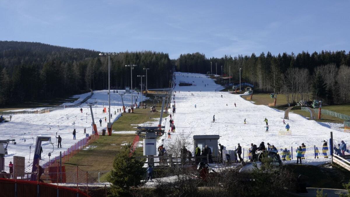 People ski on artificial ski slopes in the resort of St. Corona in Austria. – Reuters