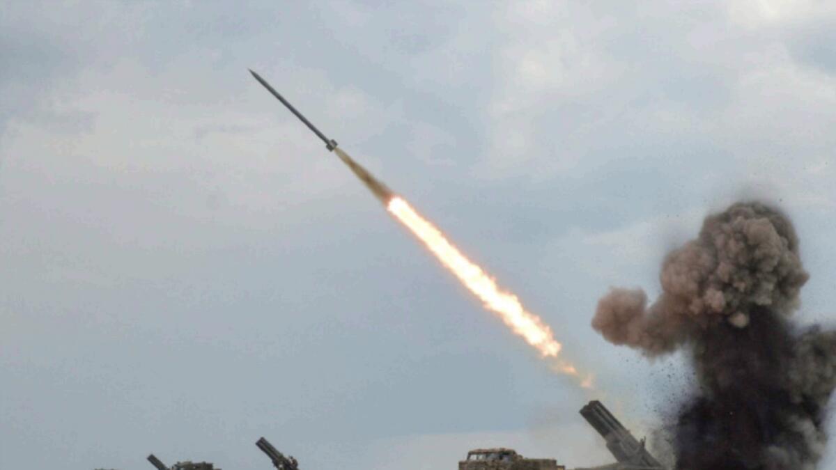 Ukrainian servicemen fire with a BM27 Uragan multiple launch rocket system at a position in Kharkiv region. — Reuters