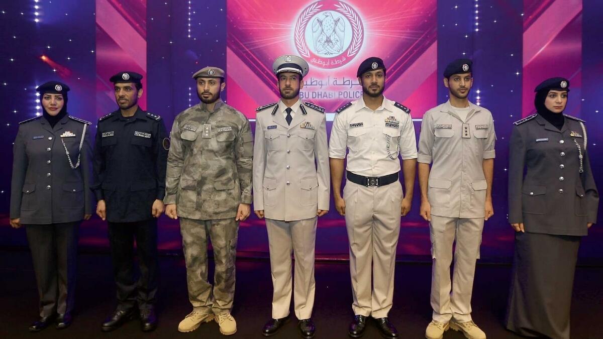Members of Abu Dhabi Police display various outfits during the launch of new uniforms for the police at the Armed Forces Officers Club in Abu Dhabi on Wednesday. — Photo by Ryan Lim 