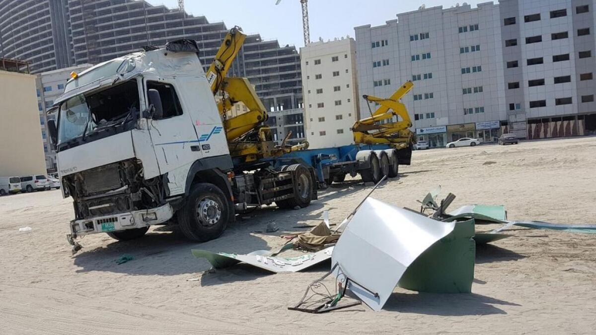 Four hurt as truck crashes into Sharjah building