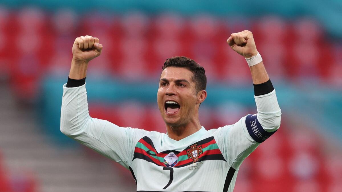 Portugal's Cristiano Ronaldo celebrates at the end of the match against Hungary. (AFP)