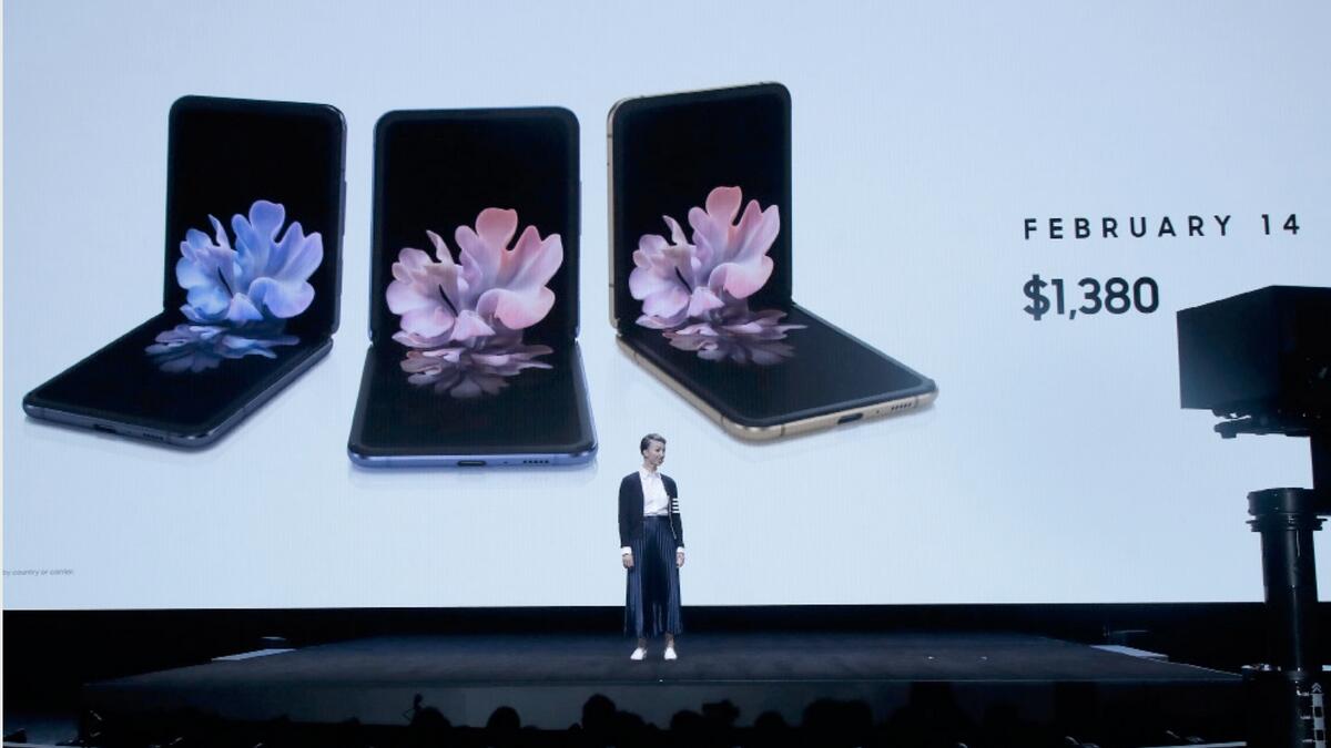 The new phone can unfold from a small square upward into a traditional smartphone form, and will go on sale Feb. 14 starting at $1,380.  (Photo: AP)