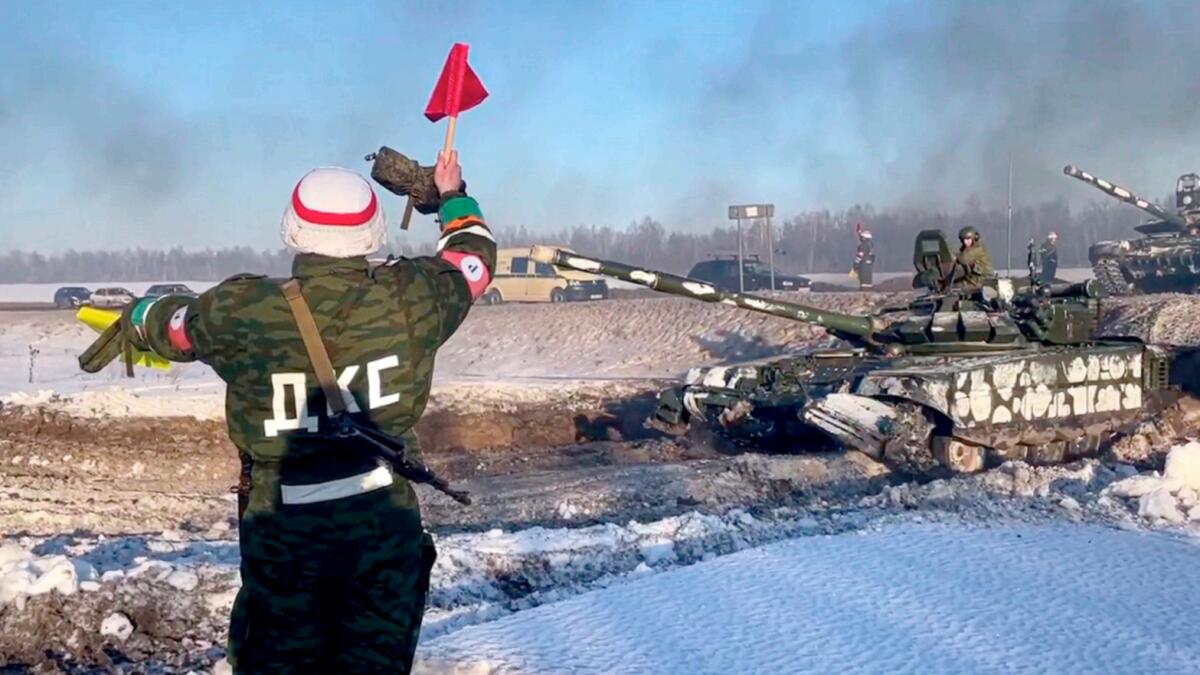 In this photo taken from video provided by the Russian Defence Ministry Press Service, Russian army tanks move back to their permanent base after drills. — AP