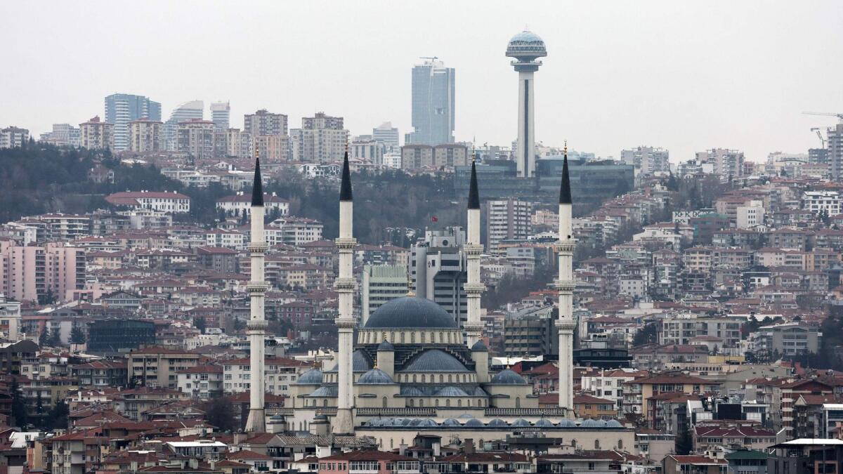 This photograph shows a view of the Kocatepe mosque and Atakule, in Ankara.