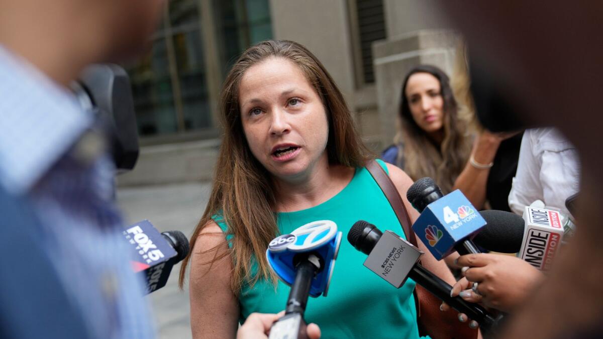 Sexual assault survivor Liz Hall speaks to members of the media after sentencing proceedings concluded for convicted sex offender Robert Hadden outside Federal Court on Tuesday. — AP