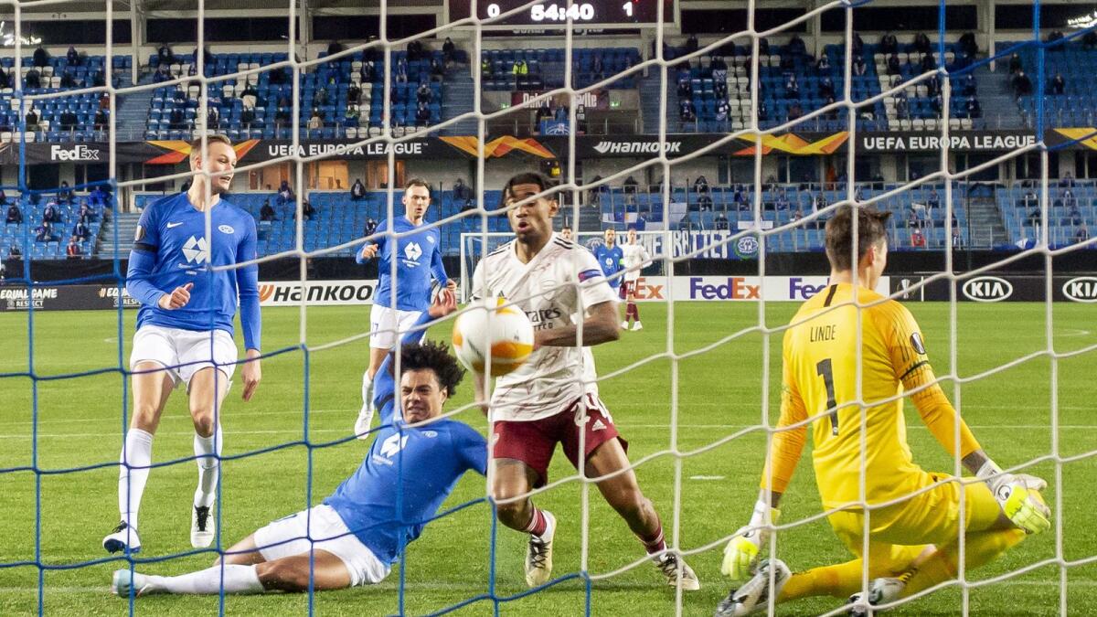 Arsenal's Reiss Nelson scores their second goal in a 3-0 win at Norway's Molde.