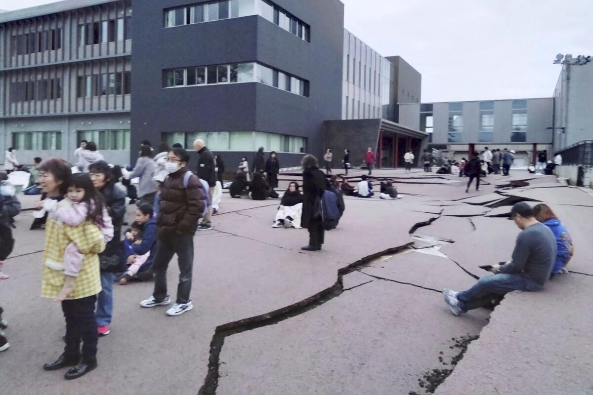 Cracks are seen on the ground in Wajima, Ishikawa prefecture, Japan Monday, Jan. 1, 2024, following an earthquake. Photo: AP