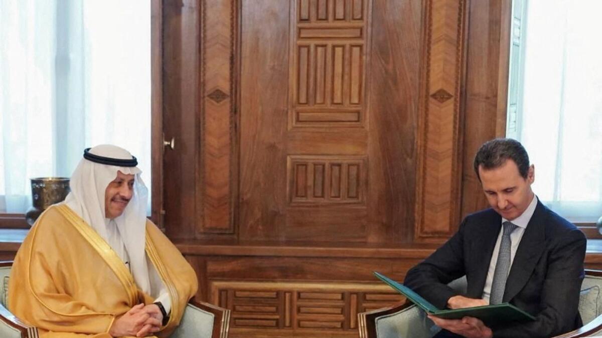 Syria's President Bashar Al Assad receives an invitation from Saudi Arabia's king through Saudi Arabia Ambassador to Jordan Naif bin Bandar Al Sudairi to attend the Arab League summit, in Damascus.  — Reuters file