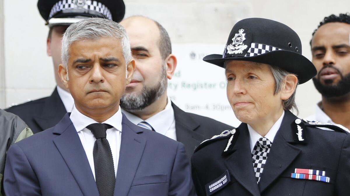 File. In this file photo taken on June 19, 2018 London Mayor Sadiq Khan (L) and Metropolitan Police Commissioner Cressida Dick stand on the steps of Islington Town Hall . Photo: AFP