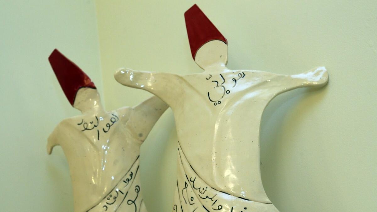 A pair of whirling Dervishes occupy prime position on her mantle