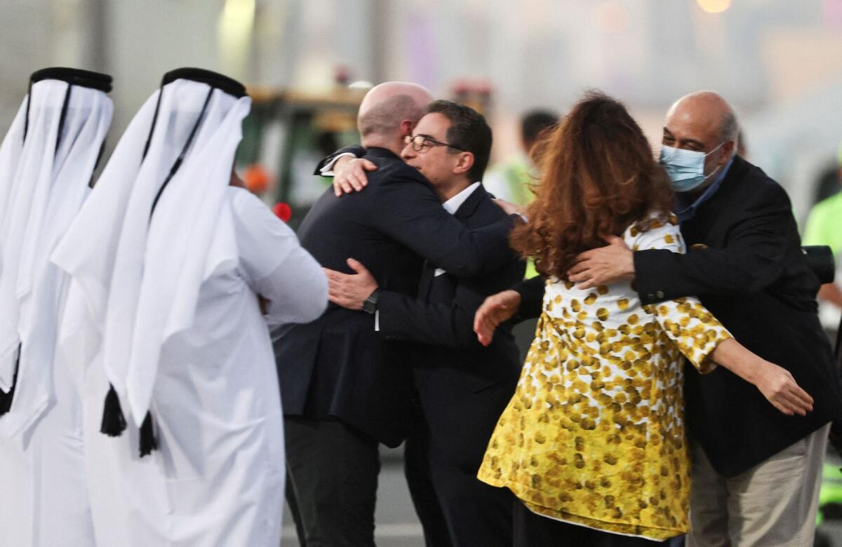 Siamak Namazi and Morad Tahbaz, who were released during a prisoner swap deal between US and Iran, arrive at Doha International Airport on Monday. — Reuters