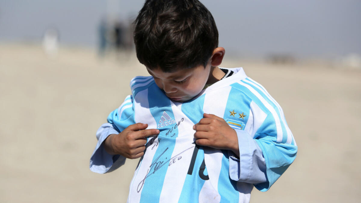 Young Afghan Messi fan threatened by criminals, Taleban