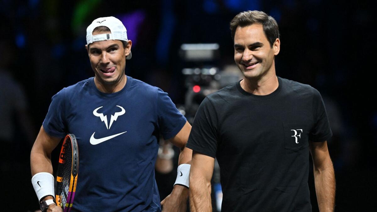 Switzerland's Roger Federer (right) and Spain's Rafael Nadal during a practice session ahead of the 2022 Laver Cup at the O2 Arena in London on Thursday. — AFP