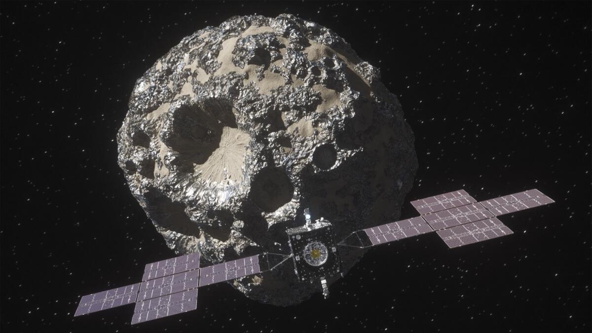This image from a video animation provided by Nasa in October 2023 depicts the spacecraft Psyche approaching the asteroid Psyche. — AP
