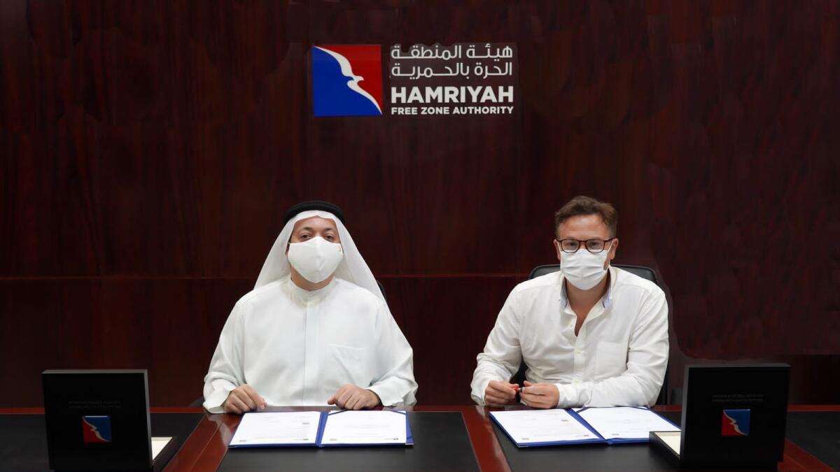 Saud Salim Al Mazrouei, HFZA director, and Mirat Bhadlawala, chief executive officer for the Energy Business and Chief Optimisation Officer for Aria Group, at the signing ceremony. — Supplied photo