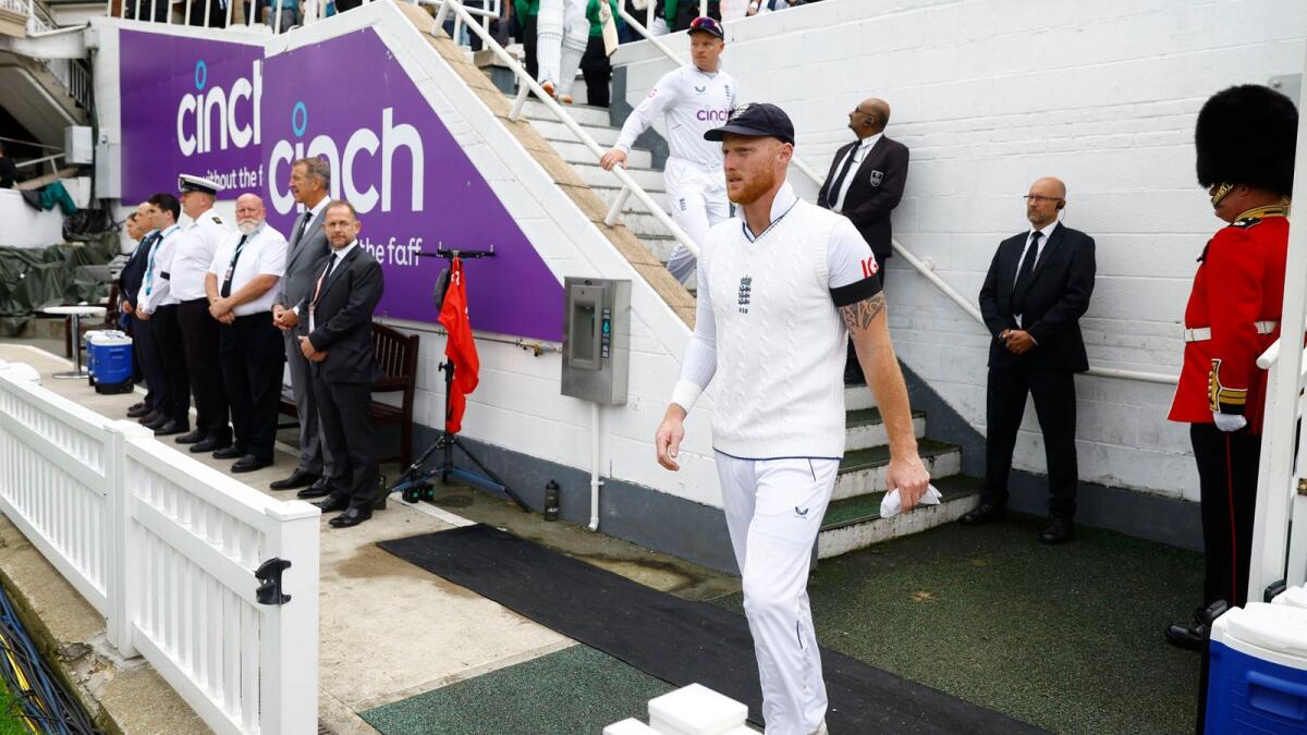 England's Ben Stokes walks out at The Oval wearing a black armband following the passing of Queen Elizabeth II. –Reuters